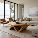 Sculptural Round Coffee Table With Curved Base For Home Decor
