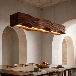 Sculpted Hanging Lamp Featuring Flowing Wave Carving For Dining