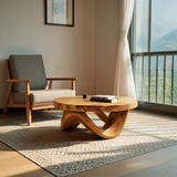Modern Sculptural Coffee Table With Curved Base For Living